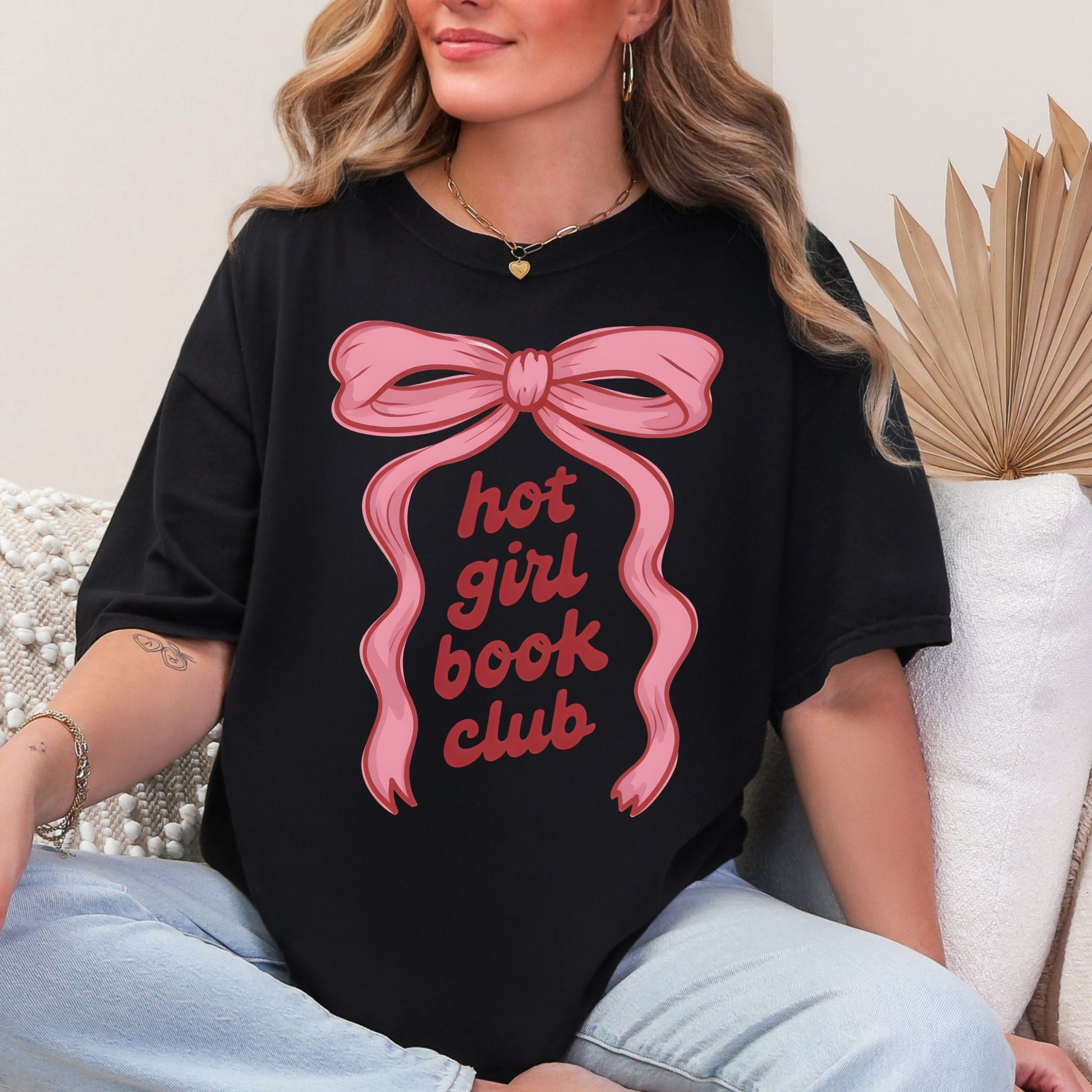 "Hot girl book club" graphic on a Black t-shirt.