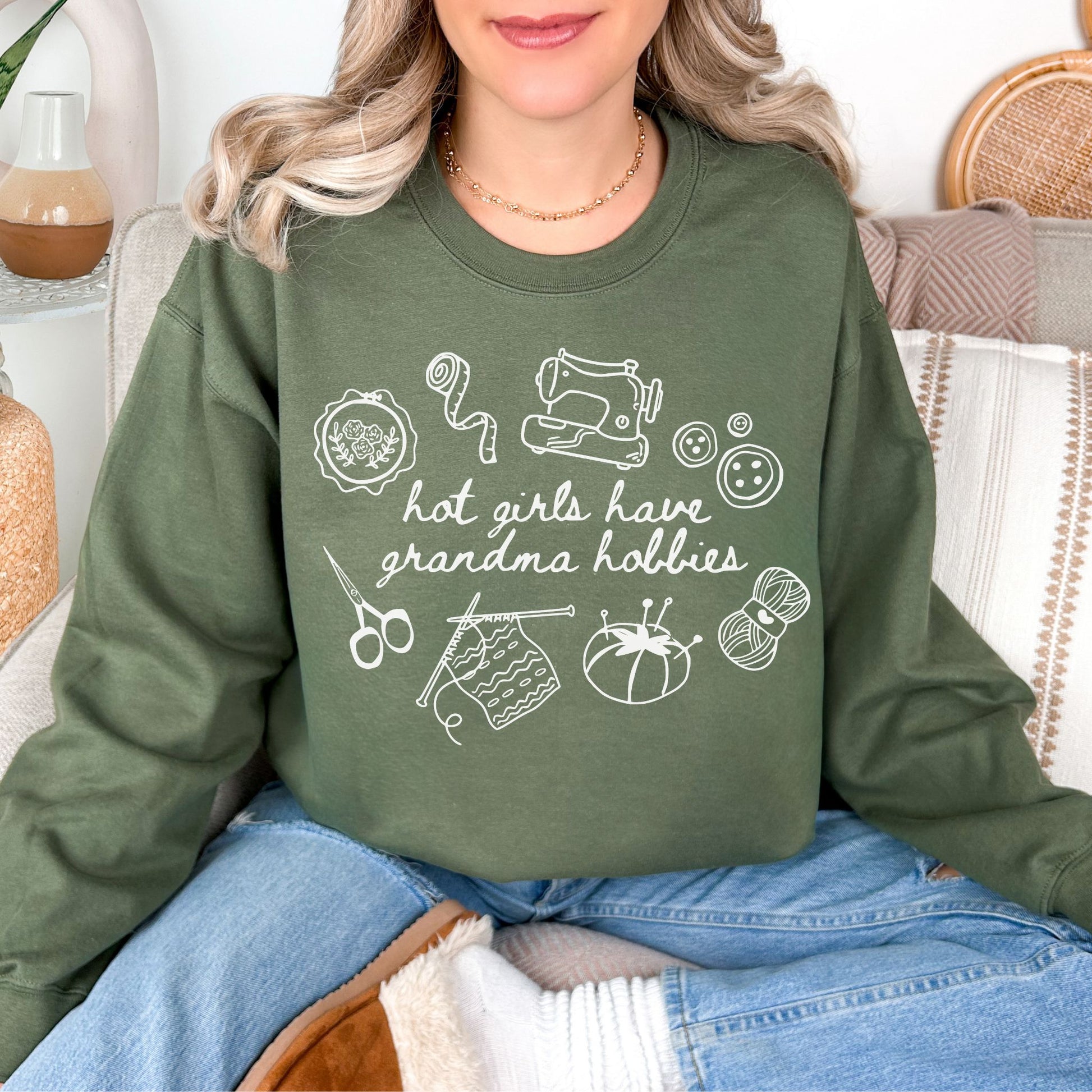 "Hot Girls Have Grandma Hobbies" graphic on muted olive green (military green) Sweatshirt