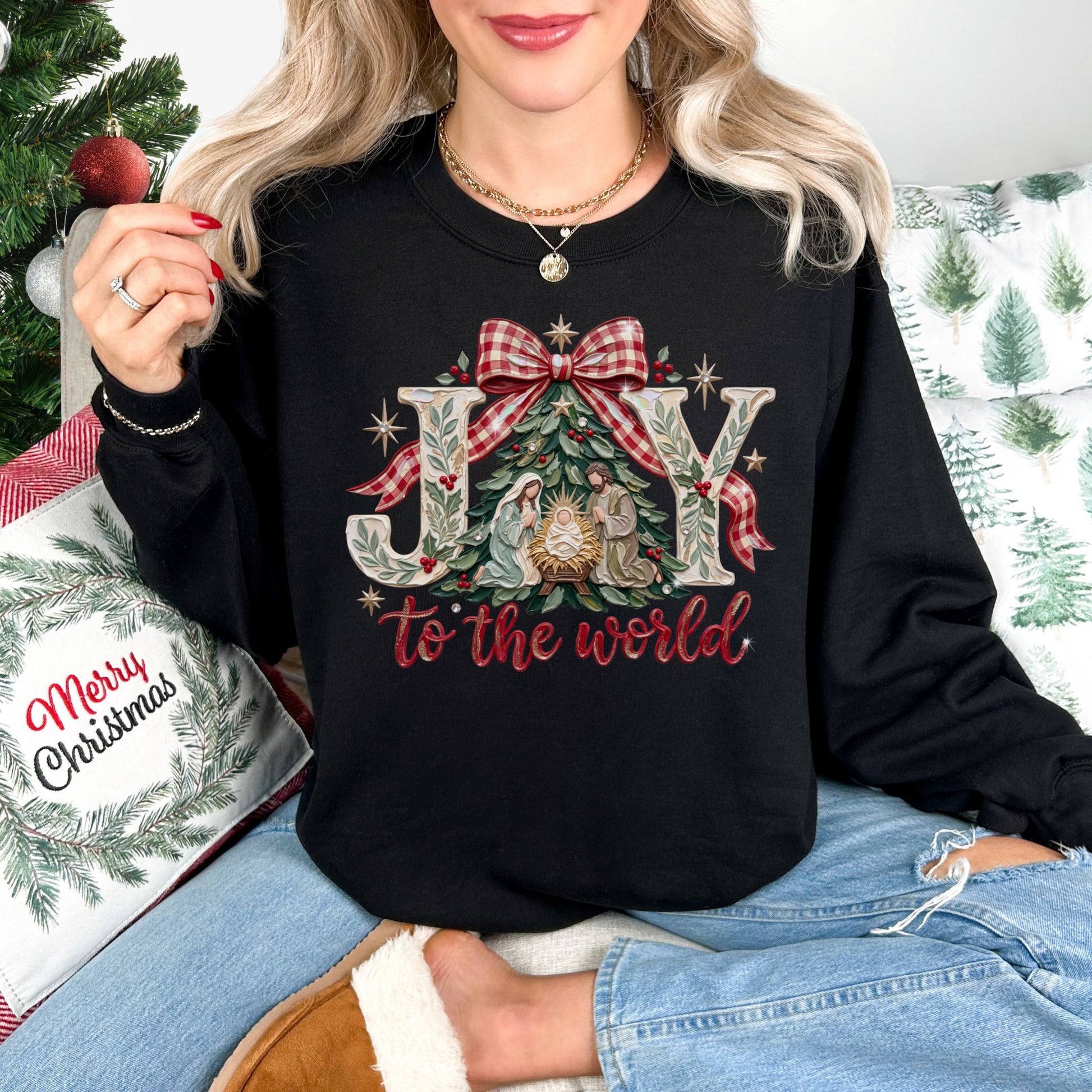 "Joy to world" graphic on a Black Gildan 18000 Sweatshirt.