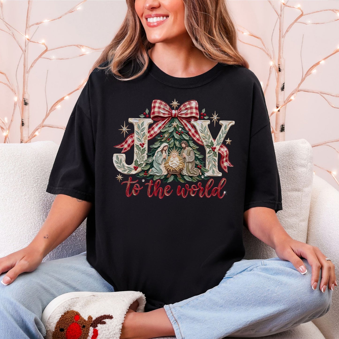 "Joy to the world" graphic on a black Comfort Colors 1717 t-shirt.