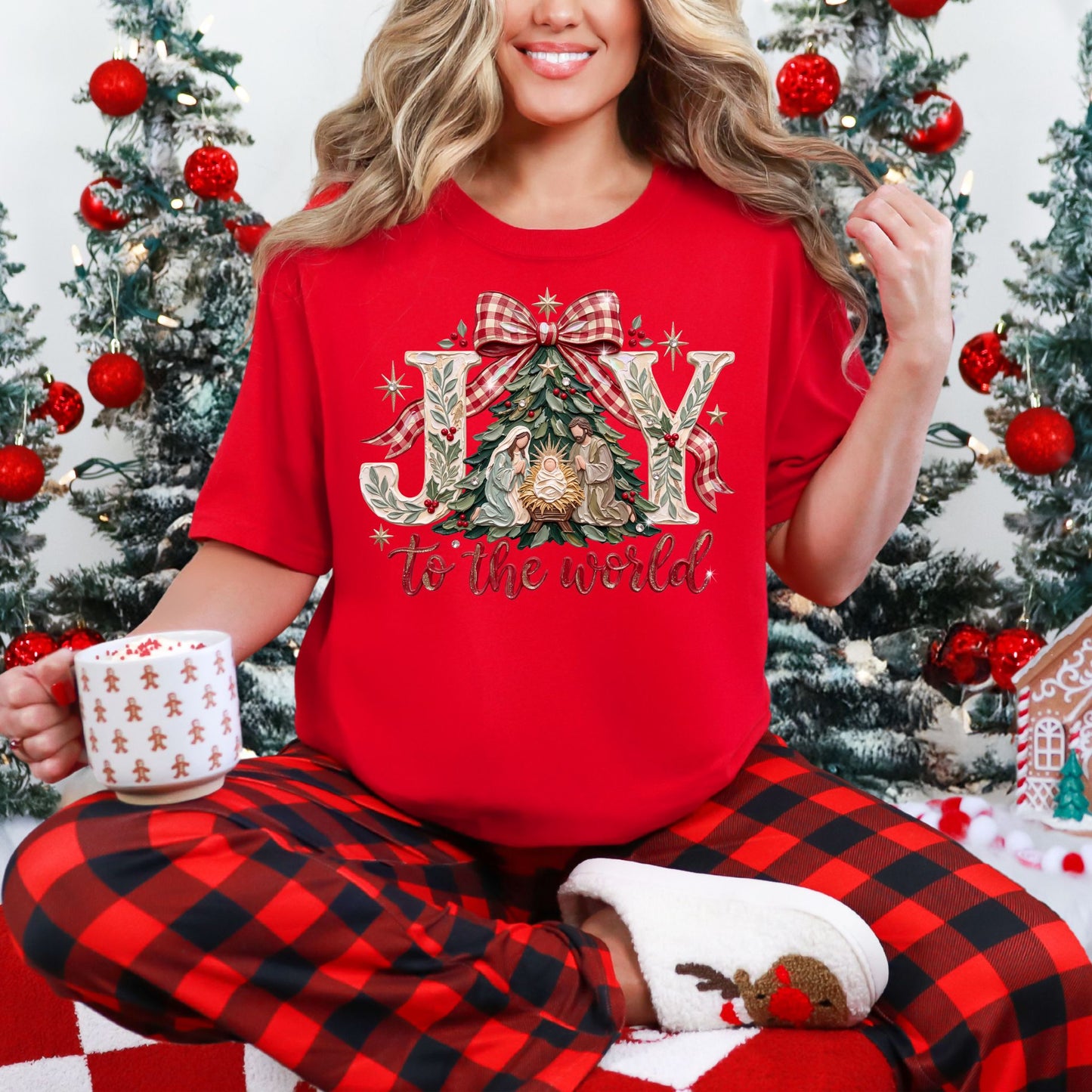 "Joy to the world" graphic on a classic true red (red) Comfort Colors 1717 t-shirt.