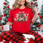 "Joy to the world" graphic on a classic true red (red) Comfort Colors 1717 t-shirt.