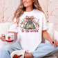 "Joy to the world" graphic on a white comfort colors 1717 t-shirt.