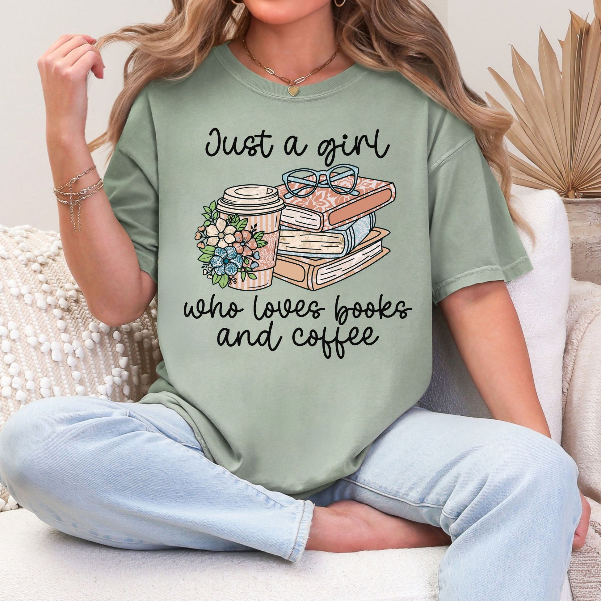 "Just a girl coffee and books" graphic on muted teal-green (bay) t-shirt.