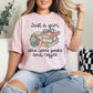 "Just a girl coffee and books" graphic on soft pink (blossom) t-shirt.