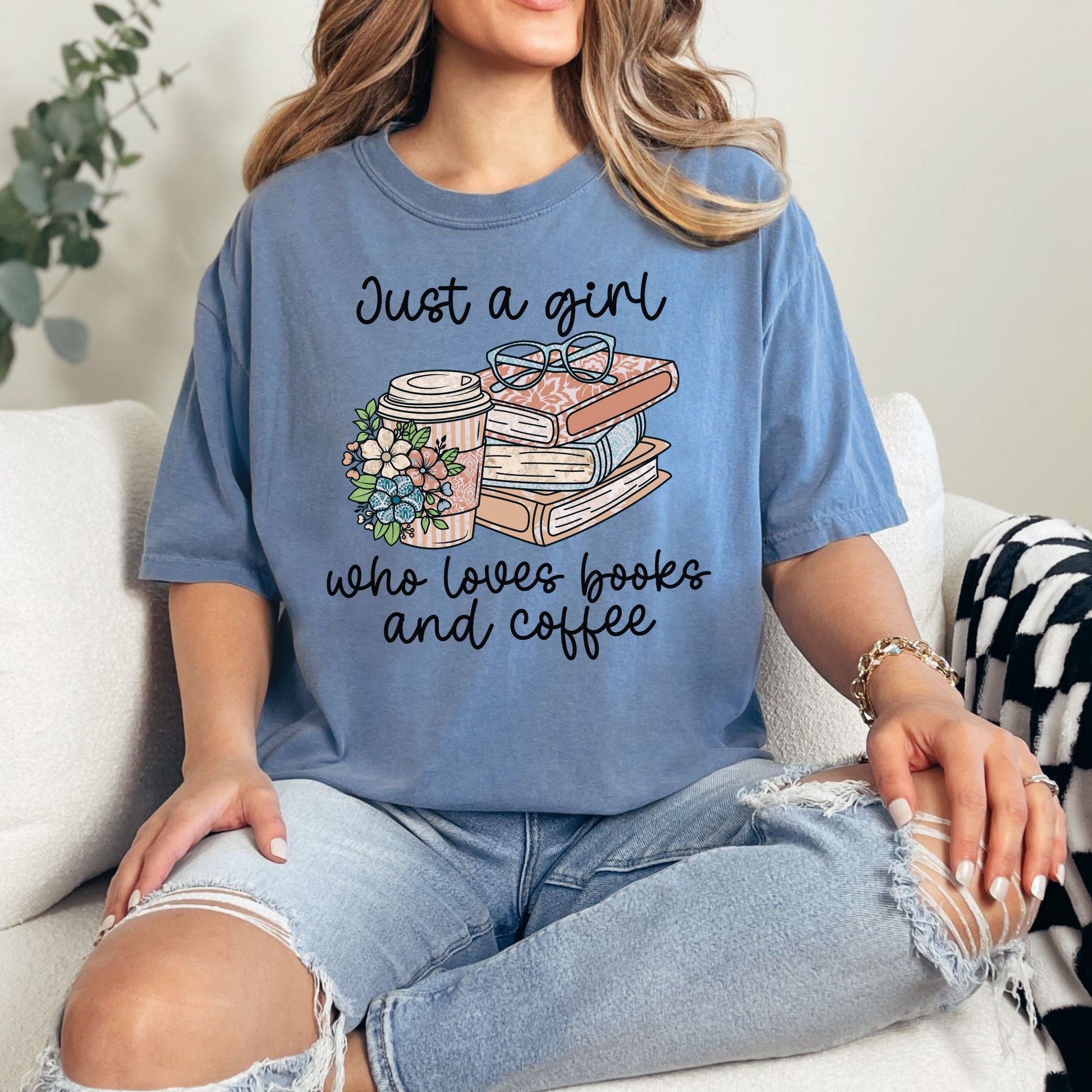 "Just a girl coffee and books" graphic on muted denim blue (blue jean) t-shirt.”