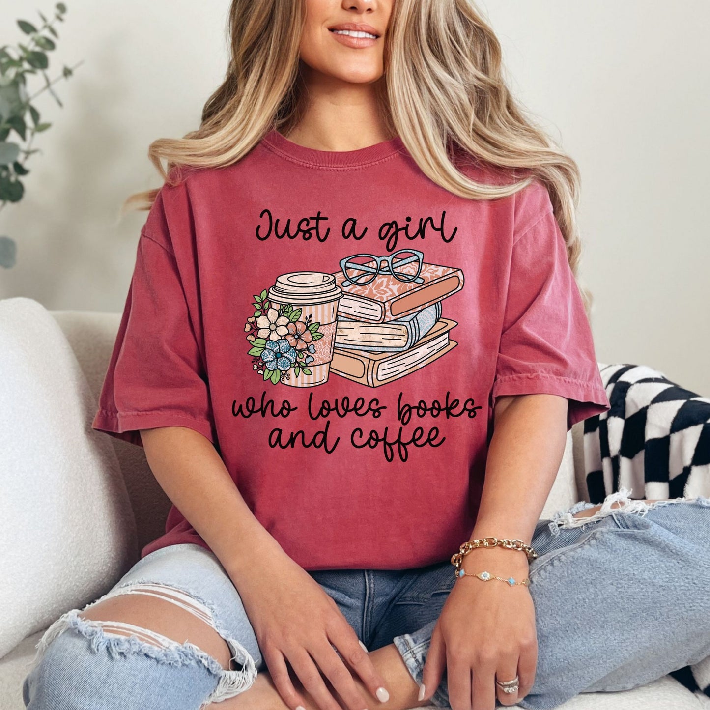 "Just a girl coffee and books" graphic on muted brick red (chili) t-shirt.