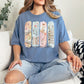 "Just One More Chapter" graphic on muted denim blue (blue jean) t-shirt.
