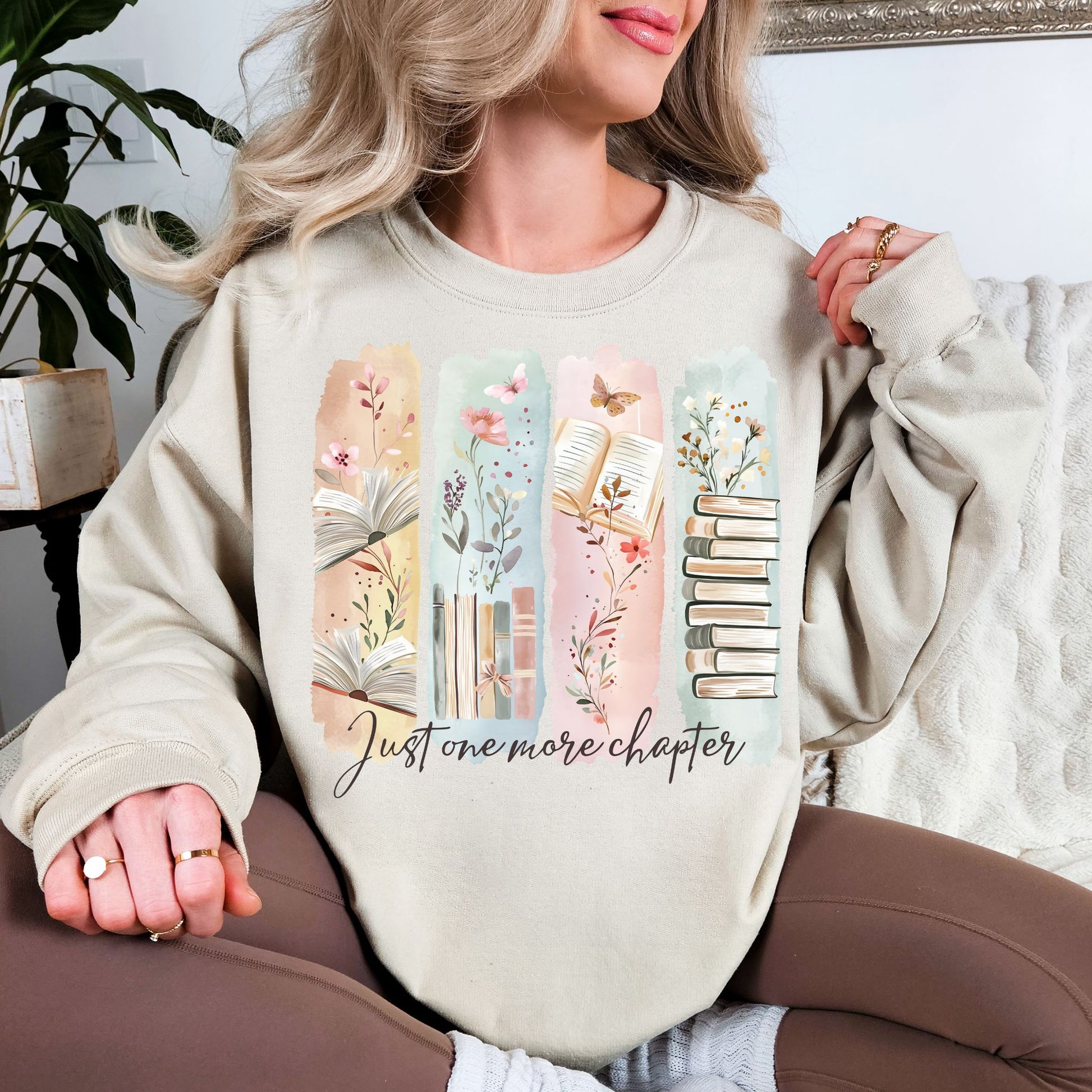 "Just One More Chapter" graphic on light warm beige (sand) Sweatshirt.