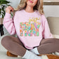 "Just Pray Floral Faux Textured" graphic on soft pale pink (light pink) Sweatshirt