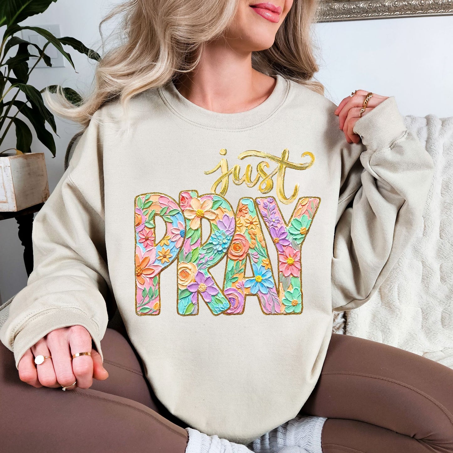 "Just Pray Floral Faux Textured" graphic on light warm beige (sand) Sweatshirt