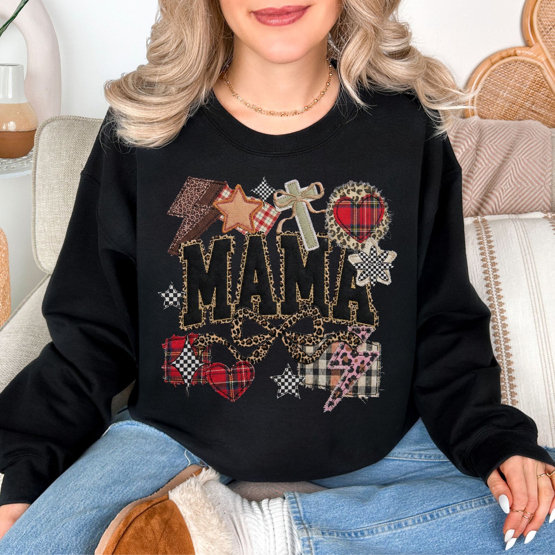 "Leopard Mama Faux Embroidery" graphic on a black Sweatshirt.