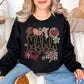 "Leopard Mama Faux Embroidery" graphic on a black Sweatshirt.