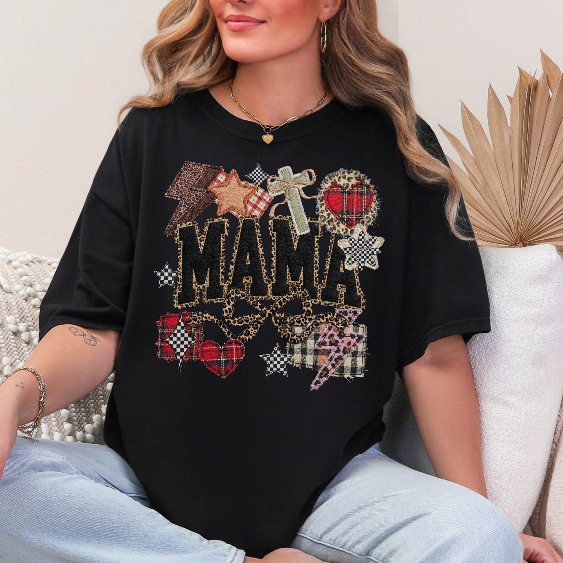 "Leopard Mama Faux Embroidery" graphic on a black t-shirt.