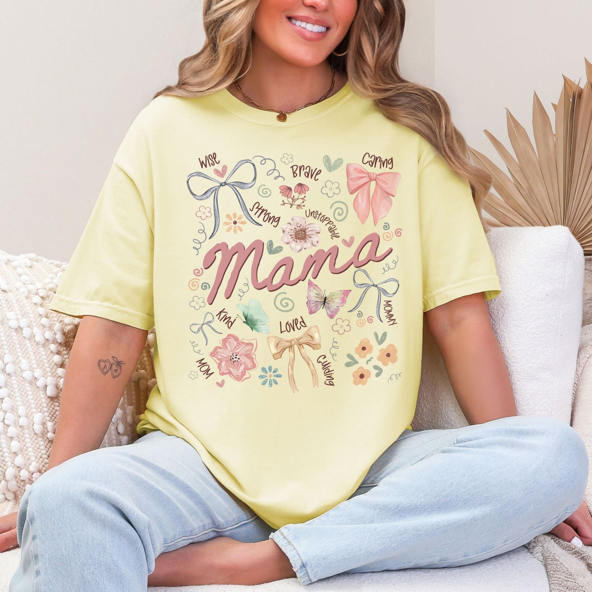 "Mama Coquette Doodle" graphic on soft pastel yellow (banana) t-shirt.