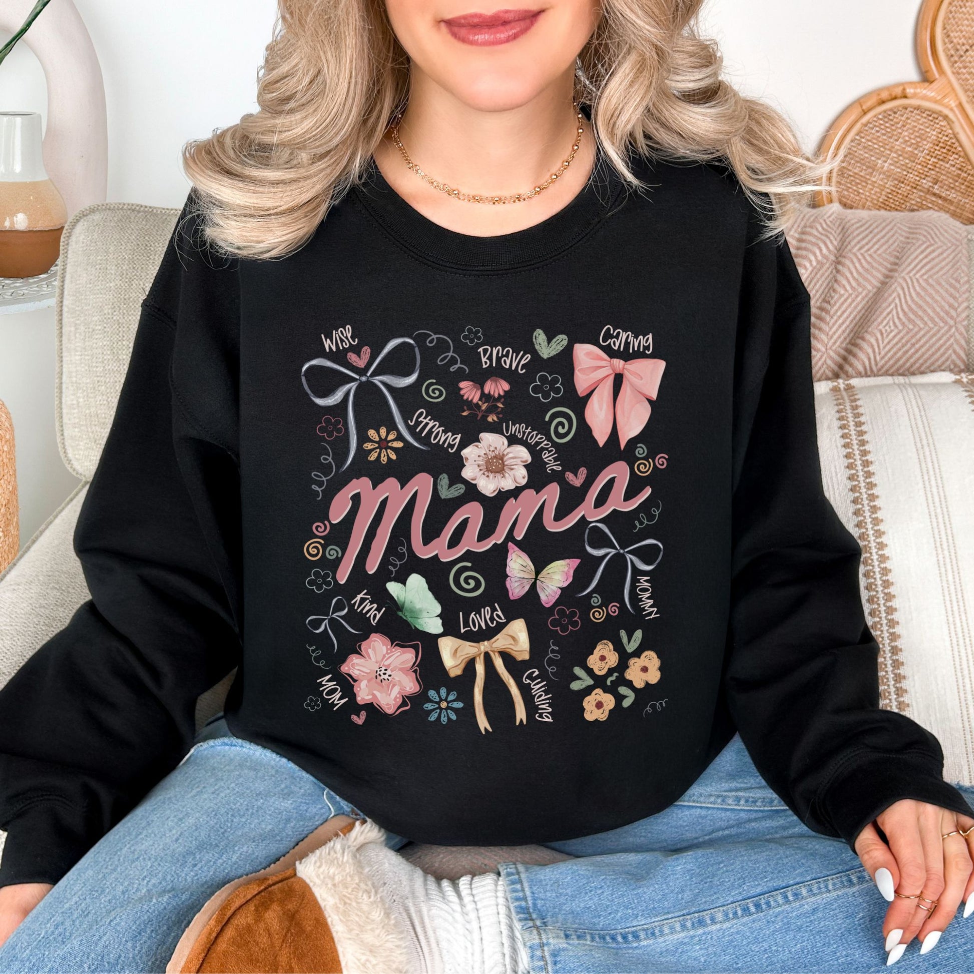 "Mama Coquette Doodle" graphic on a black sweatshirt.