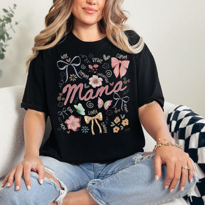 "Mama Coquette Doodle" graphic on a black t-shirt.