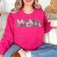 “Mama Faux Patchwork Applique" graphic on bright pink (heliconia) Sweatshirt.