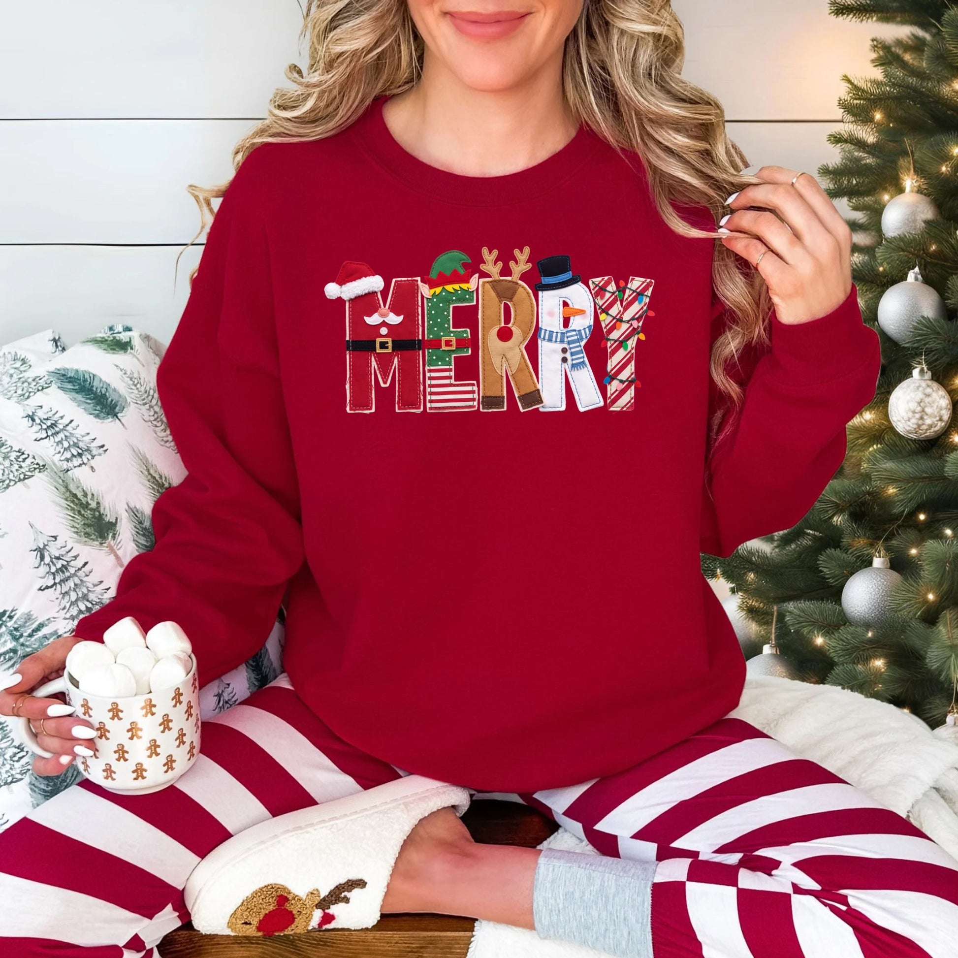 "Merry Christmas Faux Felt Appliqué" graphic on dark red (cardinal red) Gildan 18000 sweatshirt.