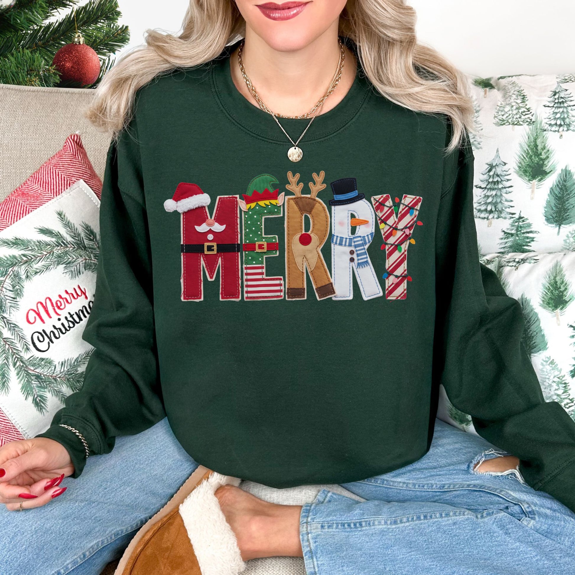 "Merry Christmas Faux Felt Appliqué" graphic on dark green (forest green) Gildan 18000 sweatshirt.