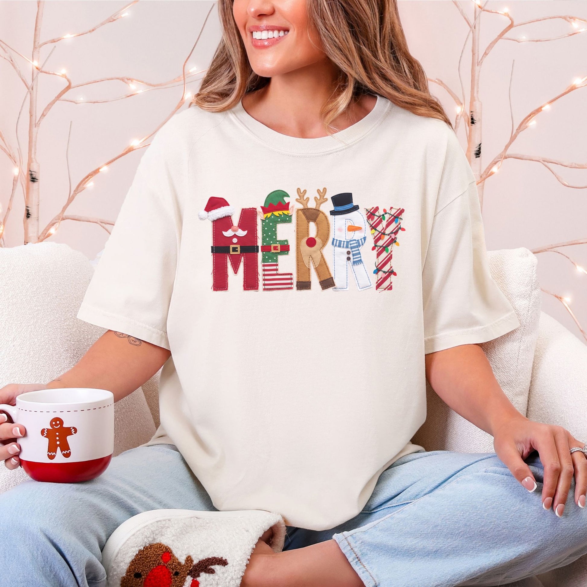 "Merry Christmas Faux Felt Appliqué" graphic on soft off-white (ivory) t-shirt.