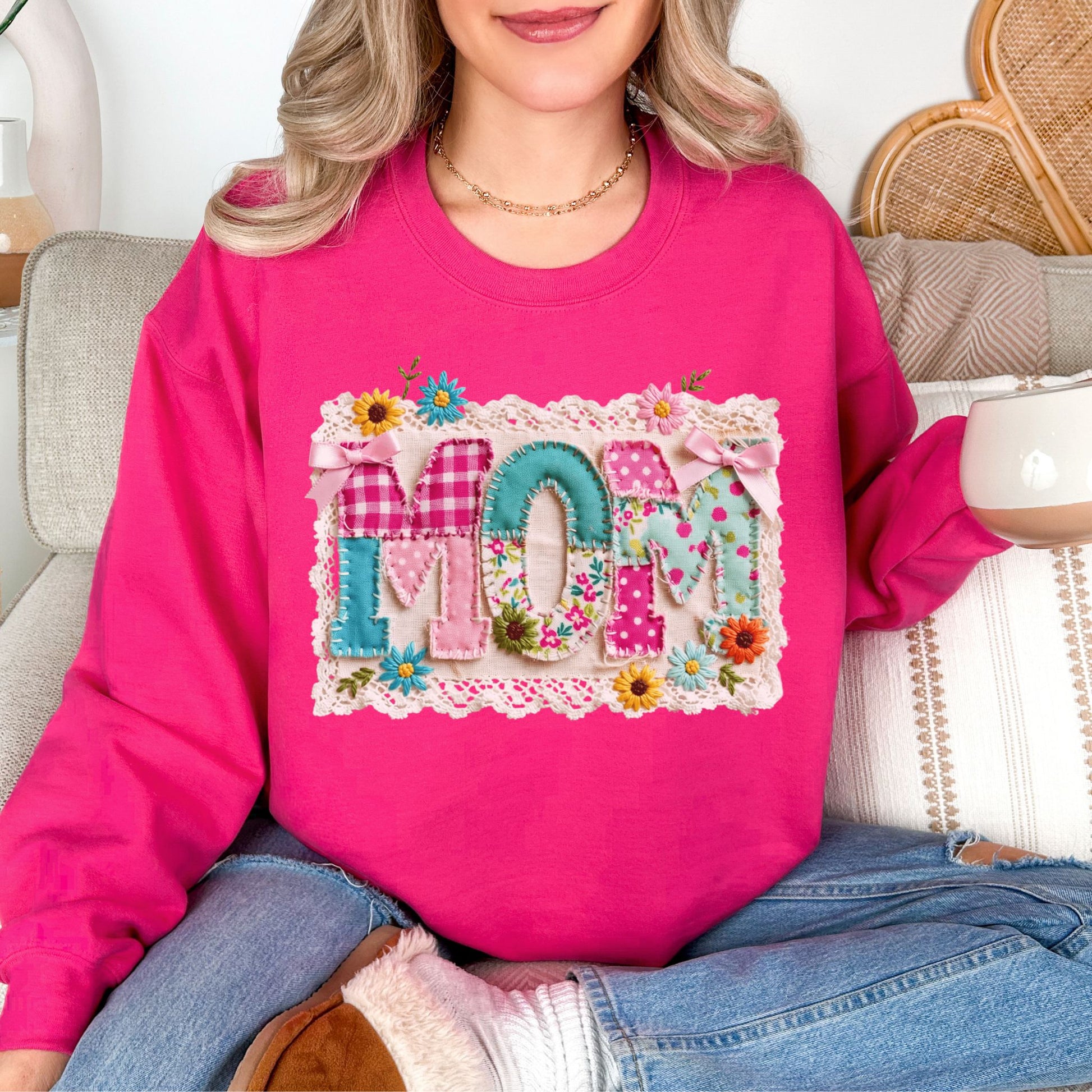 “Mom Patchwork" graphic on bright pink (heliconia) sweatshirt.