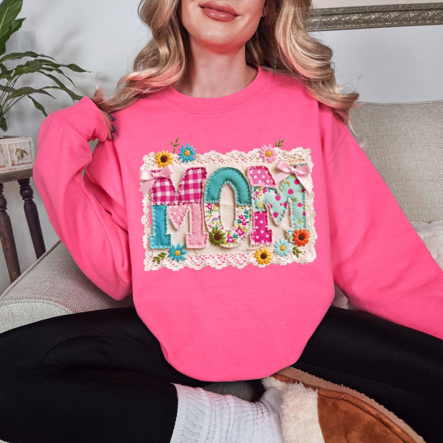 “Mom Patchwork" graphic on bright neon pink (safety pink) sweatshirt.