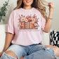 "No Shelf Control" graphic on soft pink (blossom) t-shirt.