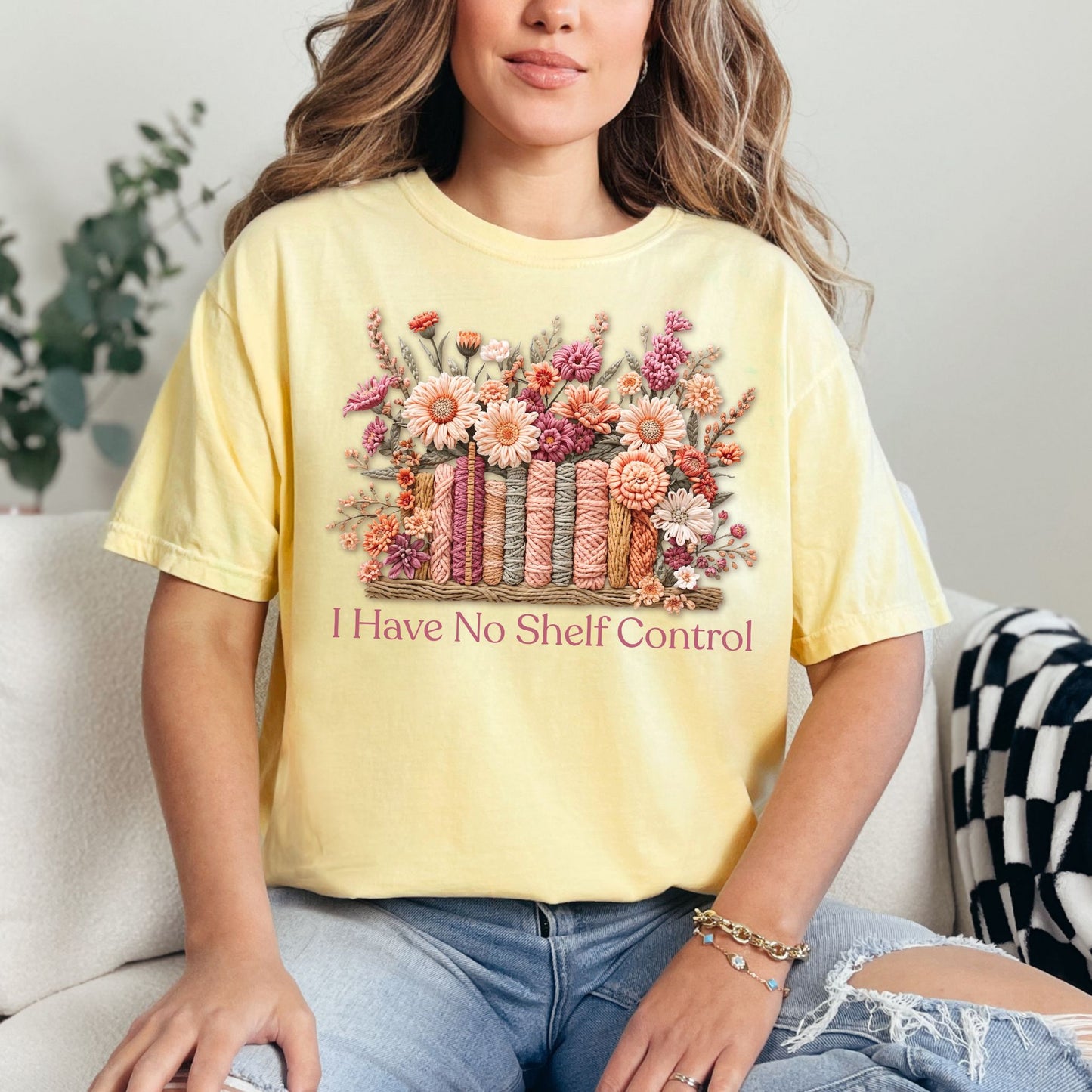 "No Shelf Control" graphic on soft yellow (butter) t-shirt.