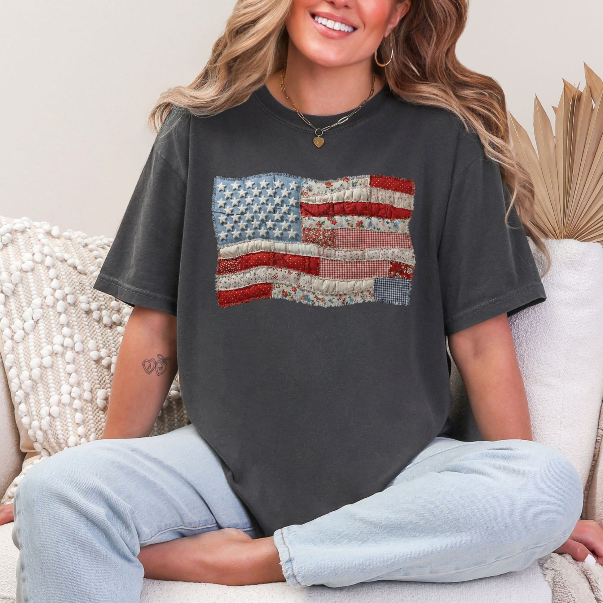 "Faux Patchwork American Flag" graphic on dark charcoal gray (pepper) T-Shirt.