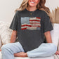 "Faux Patchwork American Flag" graphic on dark charcoal gray (pepper) T-Shirt.