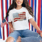 "Faux Patchwork American Flag" graphic on a white T-Shirt.