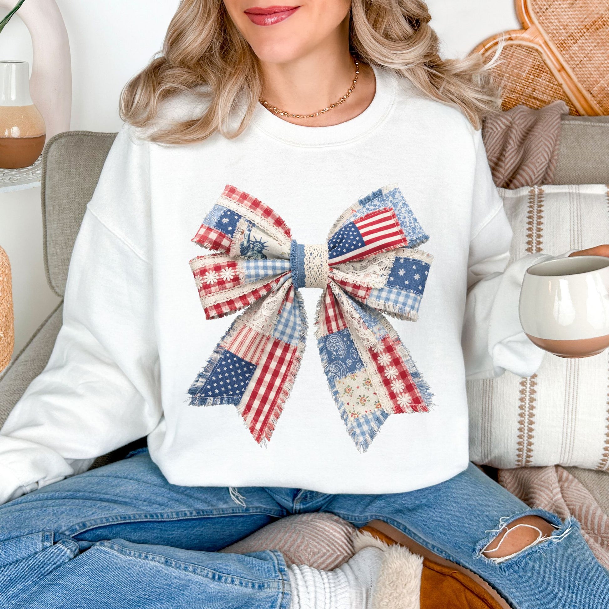“Patriotic Patchwork Faux Bow" graphic on very white (white) sweatshirt.