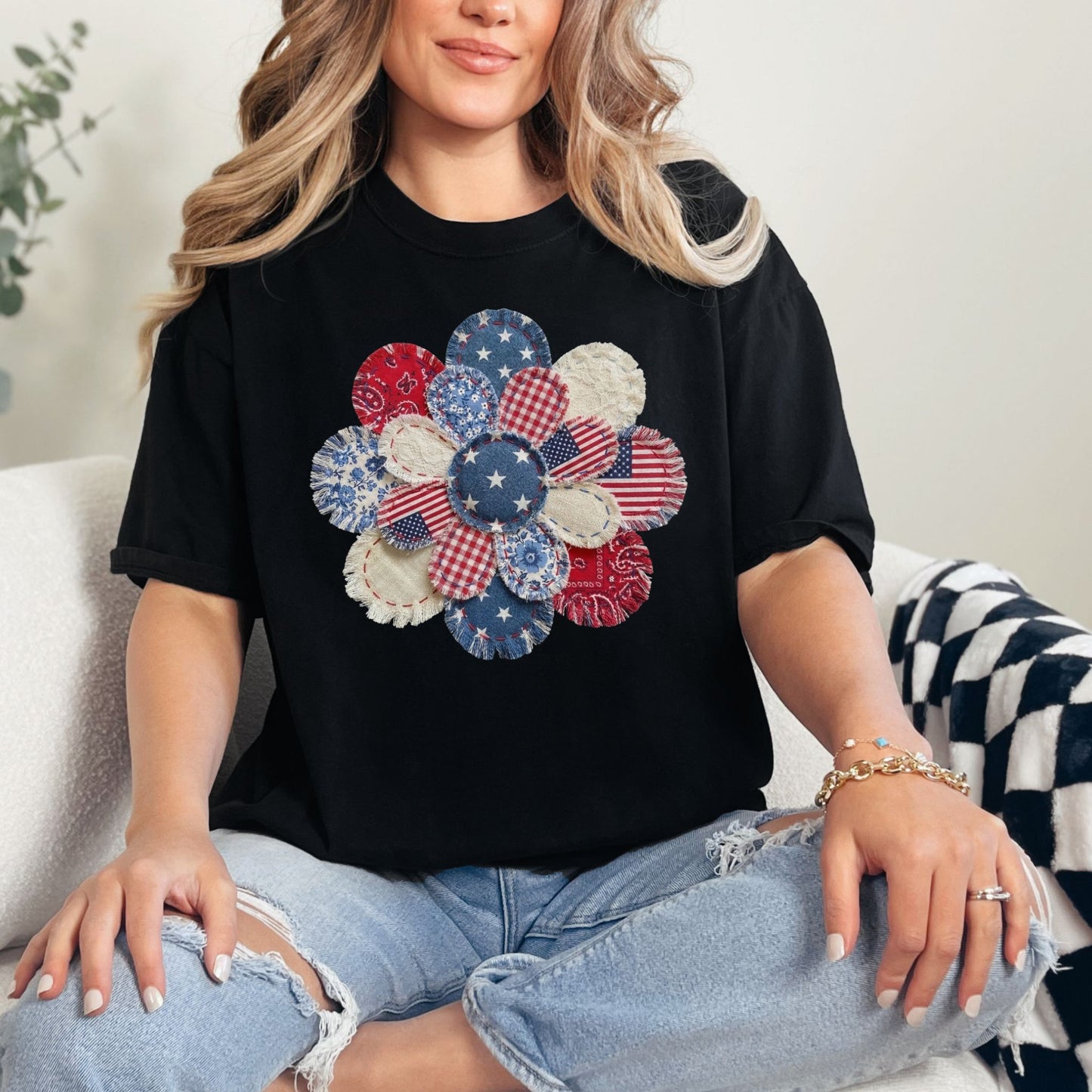 "Patriotic Patchwork Flower" graphic on a black T-Shirt.