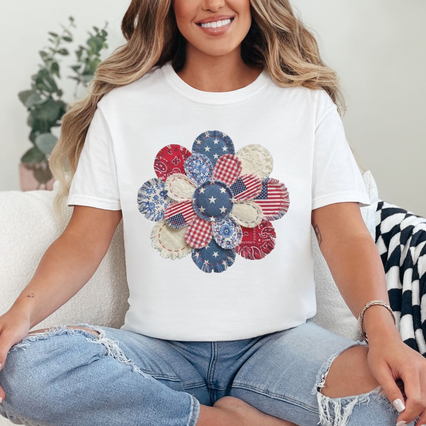 Model wearing a Comfort Colors 1717 T-shirt in bright white (white) featuring a patriotic patchwork flower design with faux embroidery texture, including red, white, and blue bandana prints, floral patterns, and striped fabric details.