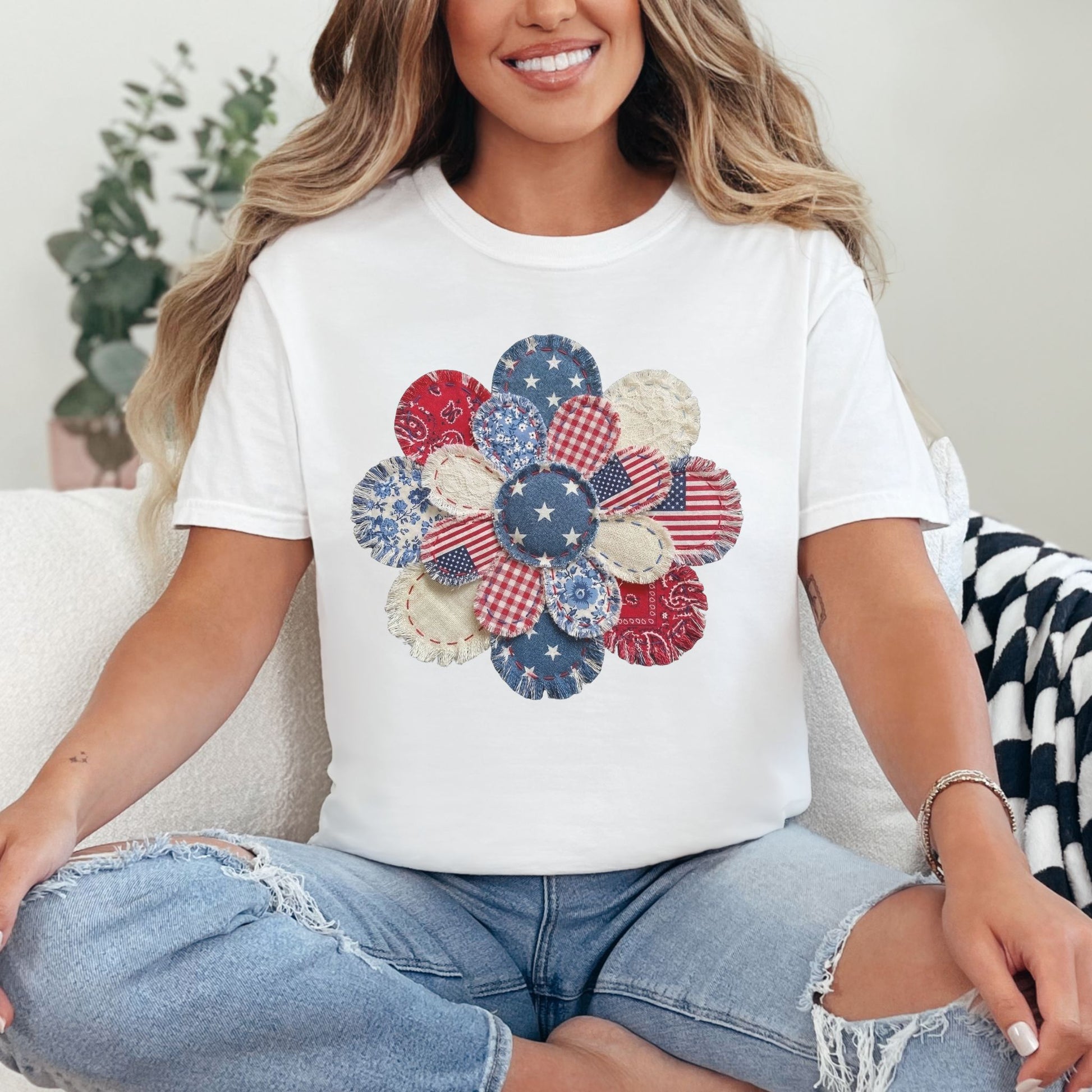 Model wearing a Comfort Colors 1717 T-shirt in bright white (white) featuring a patriotic patchwork flower design with faux embroidery texture, including red, white, and blue bandana prints, floral patterns, and striped fabric details.