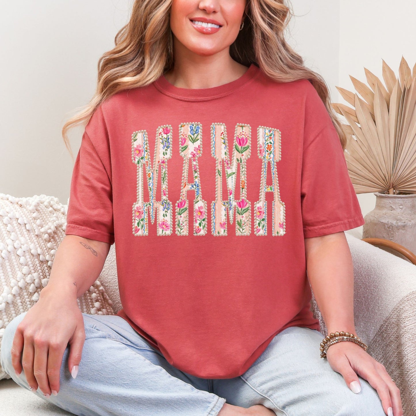 “Pearl Floral Mama" graphic on warm muted tan-brown (cumin) t-shirt.