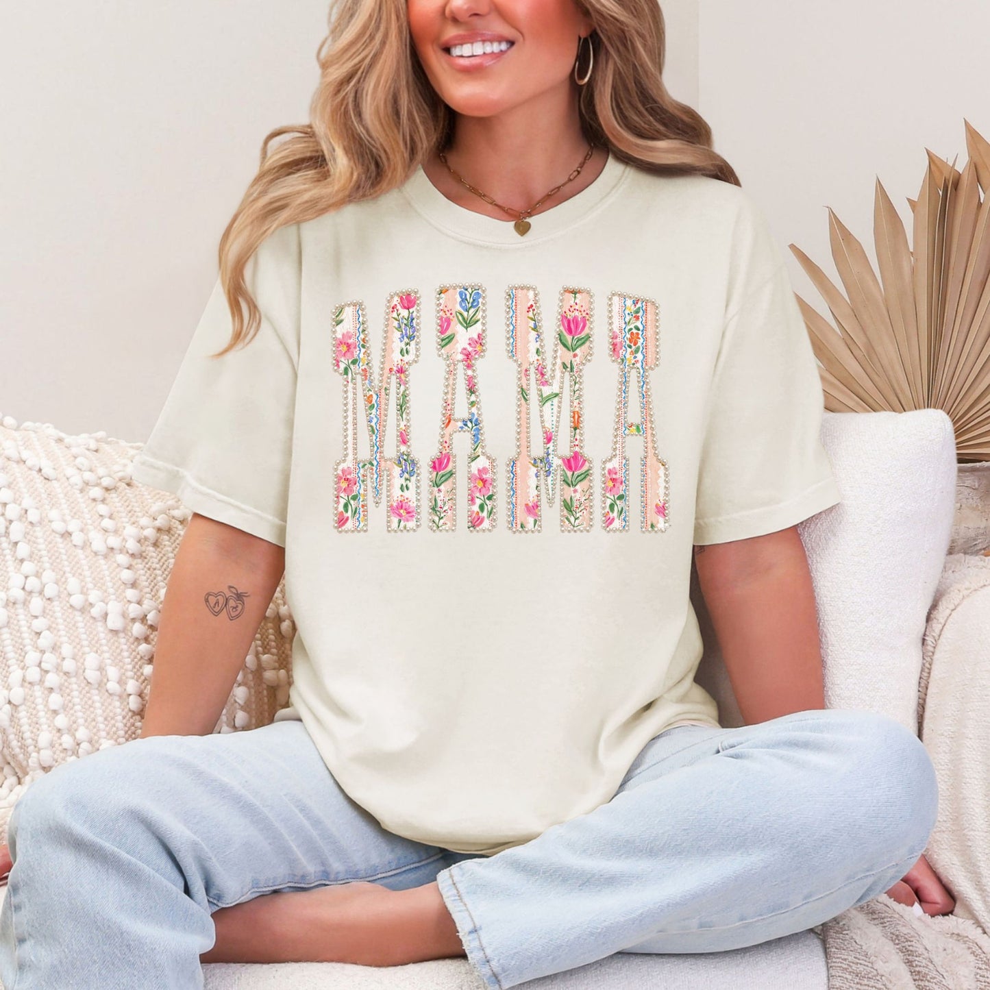 “Pearl Floral Mama" graphic on soft off-white (ivory) t-shirt.