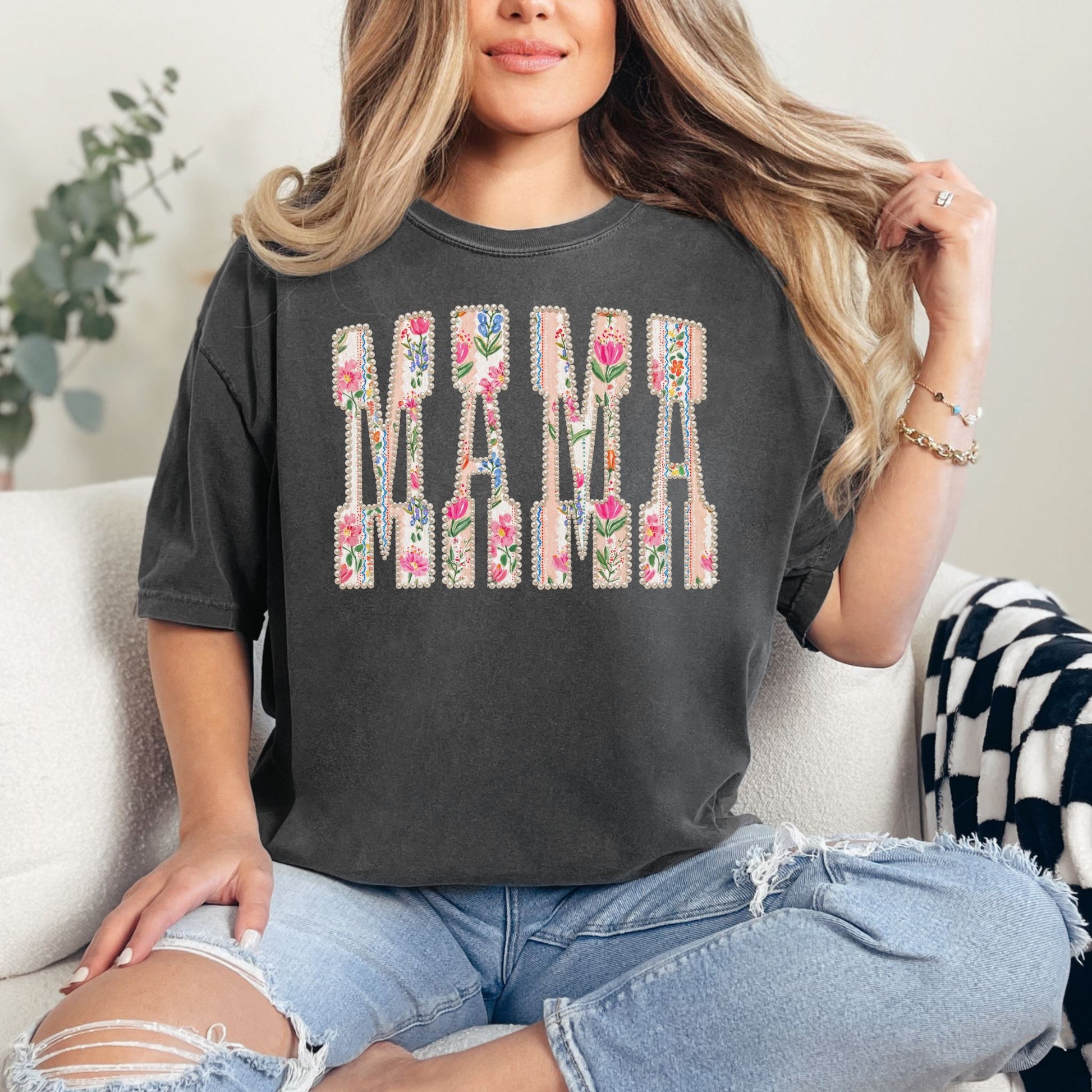 “Pearl Floral Mama" graphic on dark charcoal gray (pepper) t-shirt.