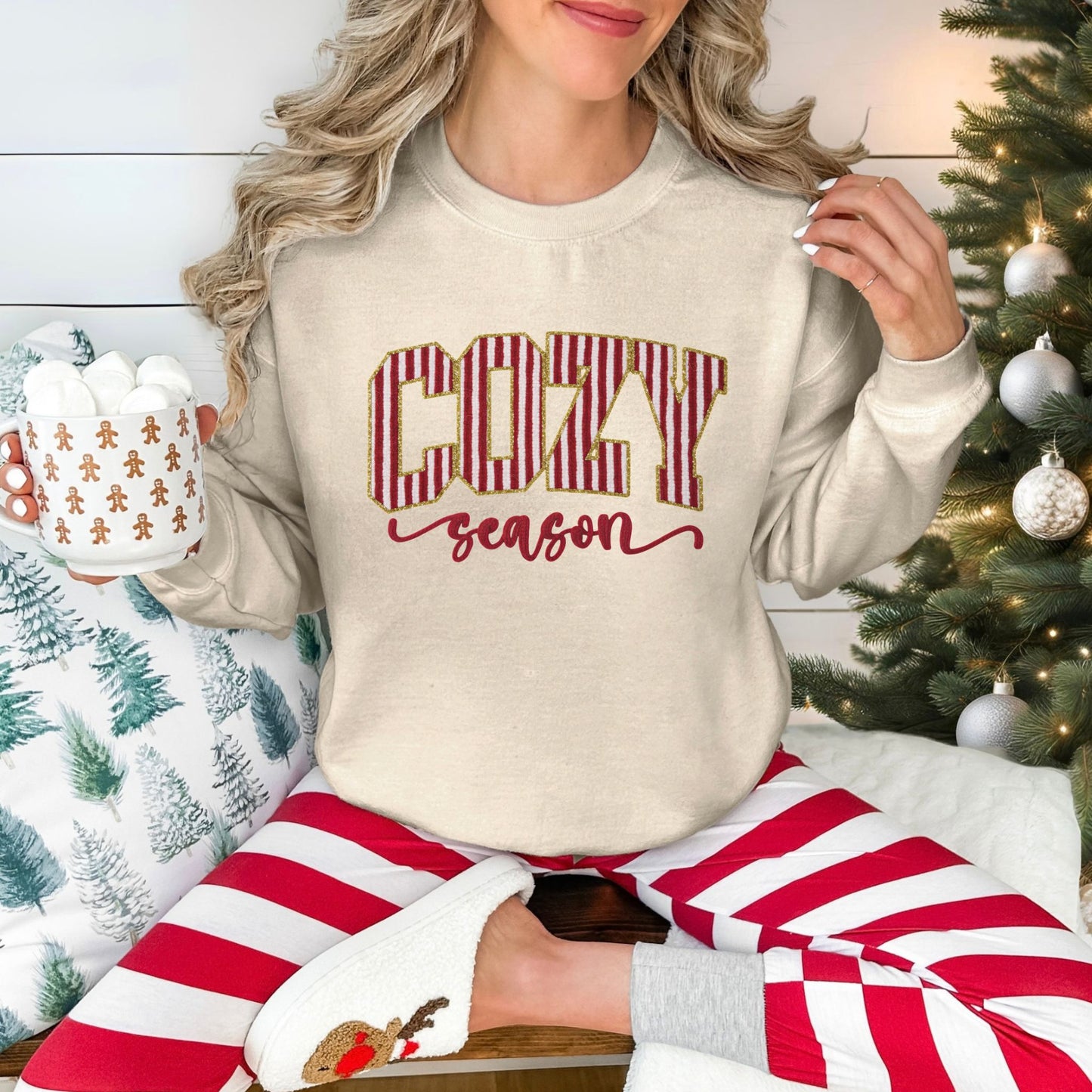 "Peppermint Cozy Season Christmas" graphic on light beige (sand) Gildan 18000 sweatshirt.