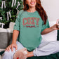"Peppermint Cozy Season Christmas" graphic on soft light green (light green) Comfort Colors 1717 T-Shirt.