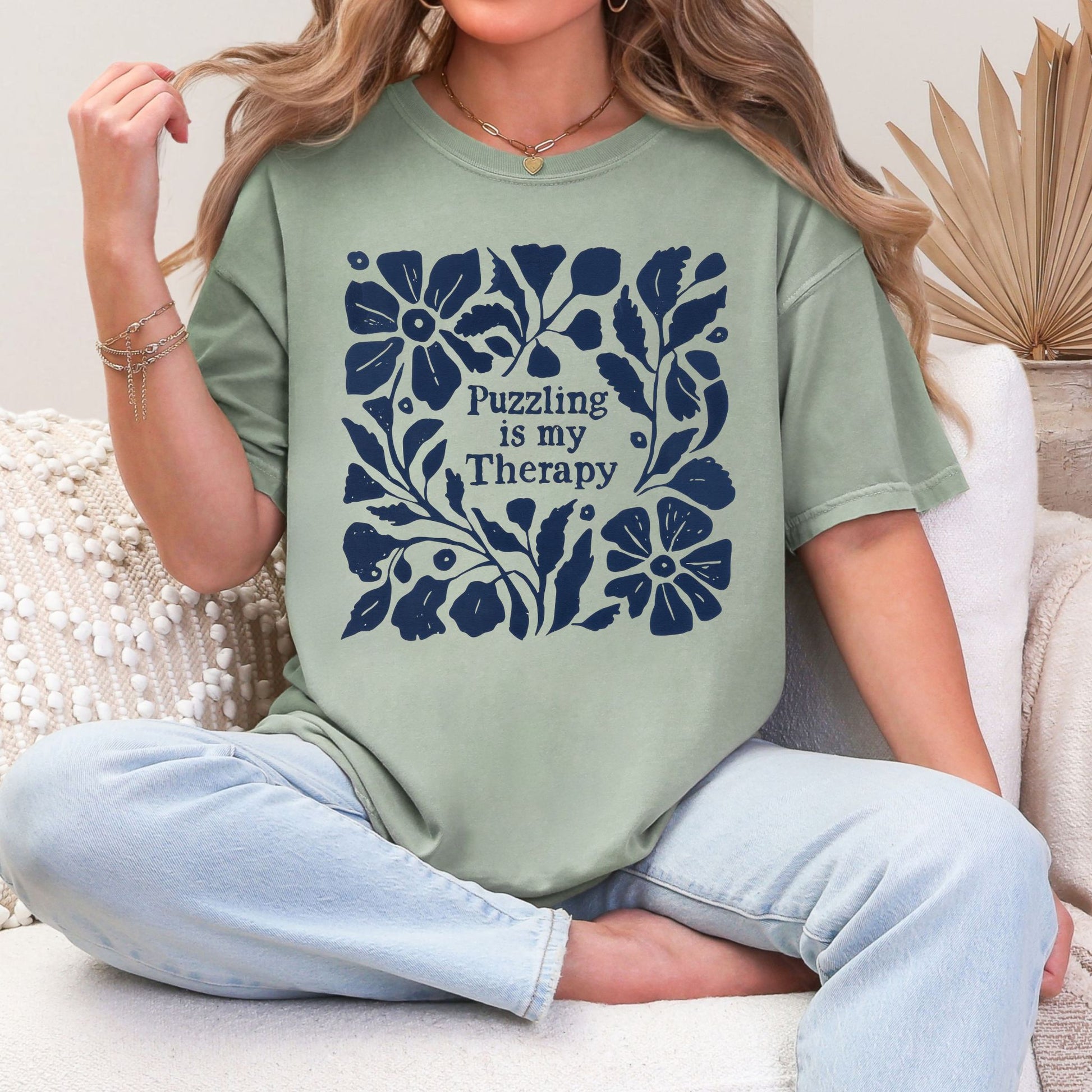 “Puzzling is my therapy" graphic on muted teal-green (bay)  t-shirt.