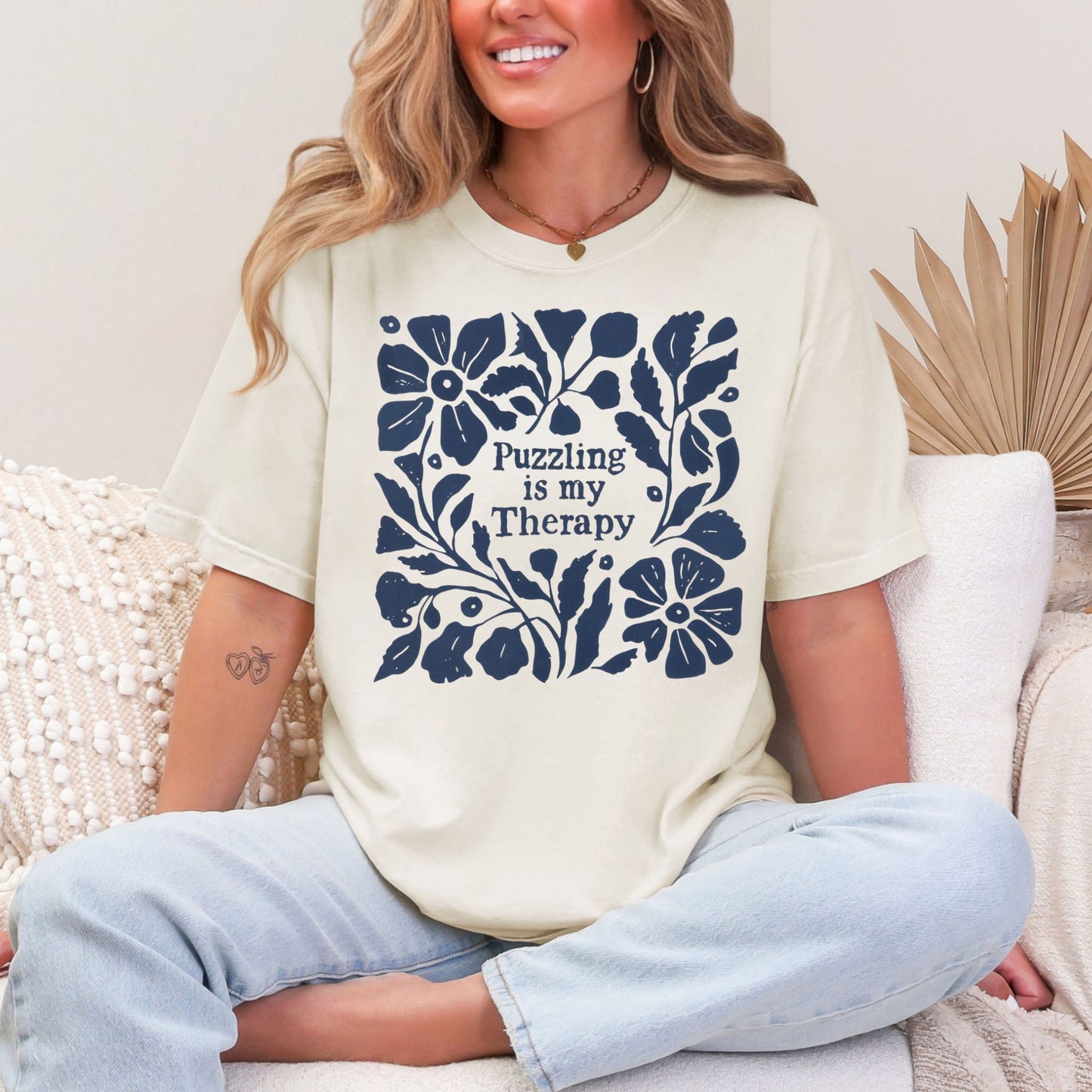 “Puzzling is my therapy" graphic on soft off-white (ivory) t-shirt.