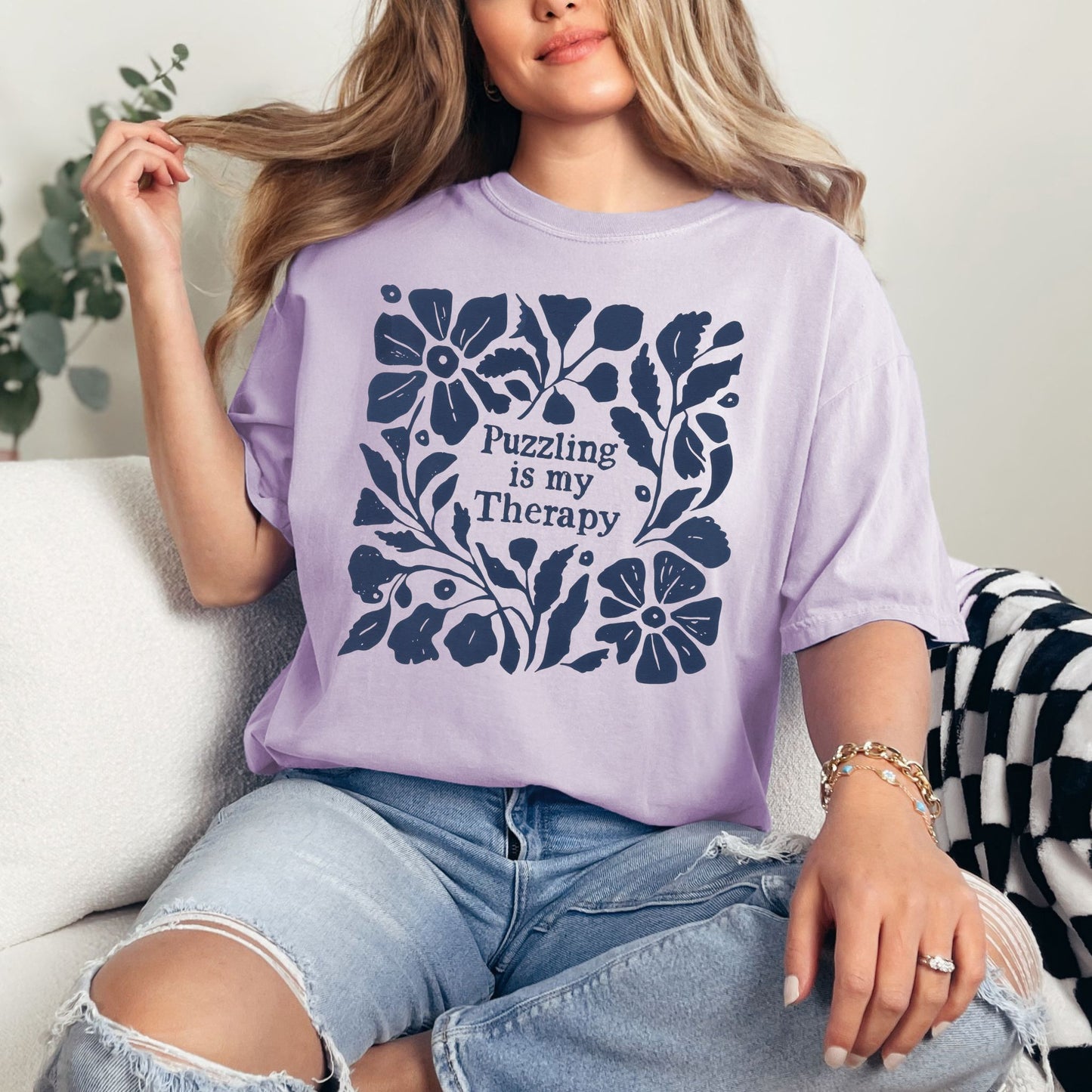 “Puzzling is my therapy" graphic on soft purple (orchid) t-shirt.
