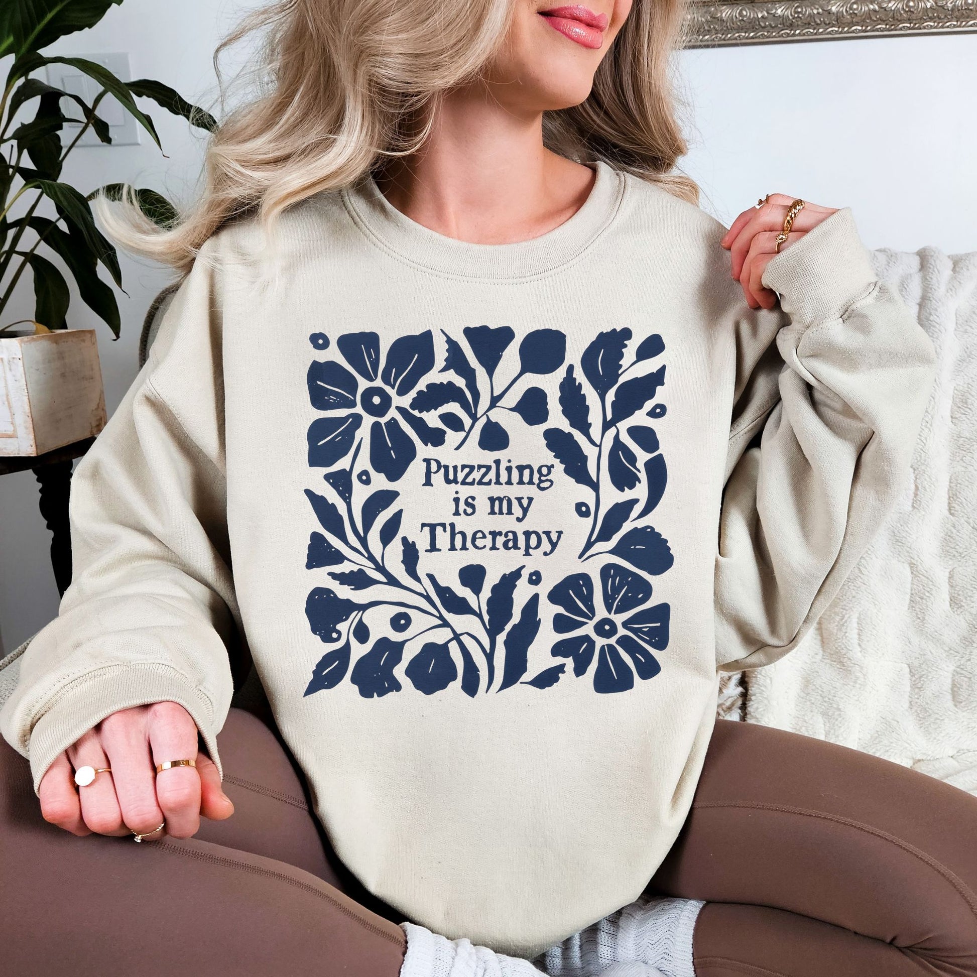 "Puzzling is my therapy" graphic on light warm beige (sand) sweatshirt.