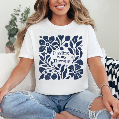 “Puzzling is my therapy" graphic on bright white (white) t-shirt.