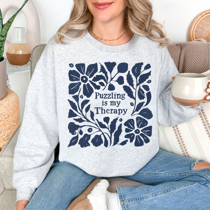 "Puzzling is my therapy" graphic on very light gray (ash) sweatshirt.