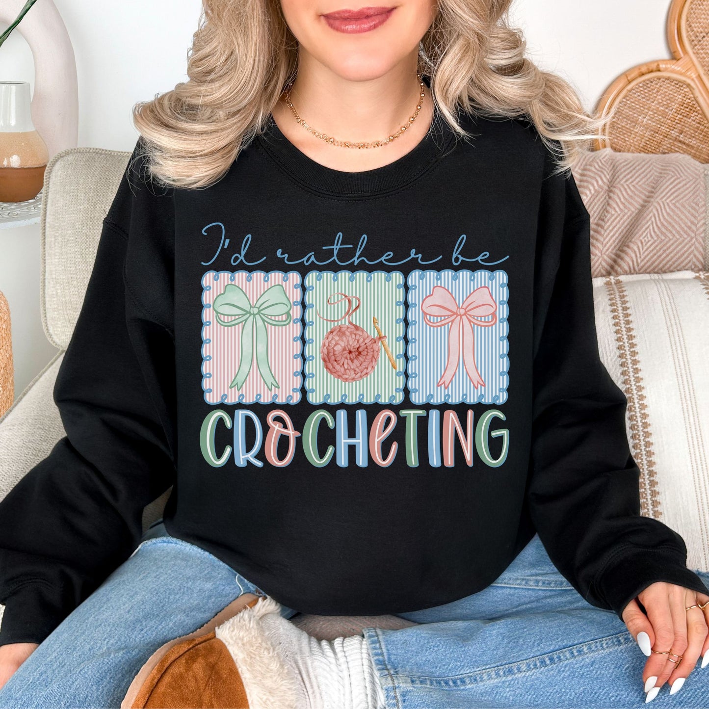 "Rather Be Crocheting" graphic on dark black (black) sweatshirt.