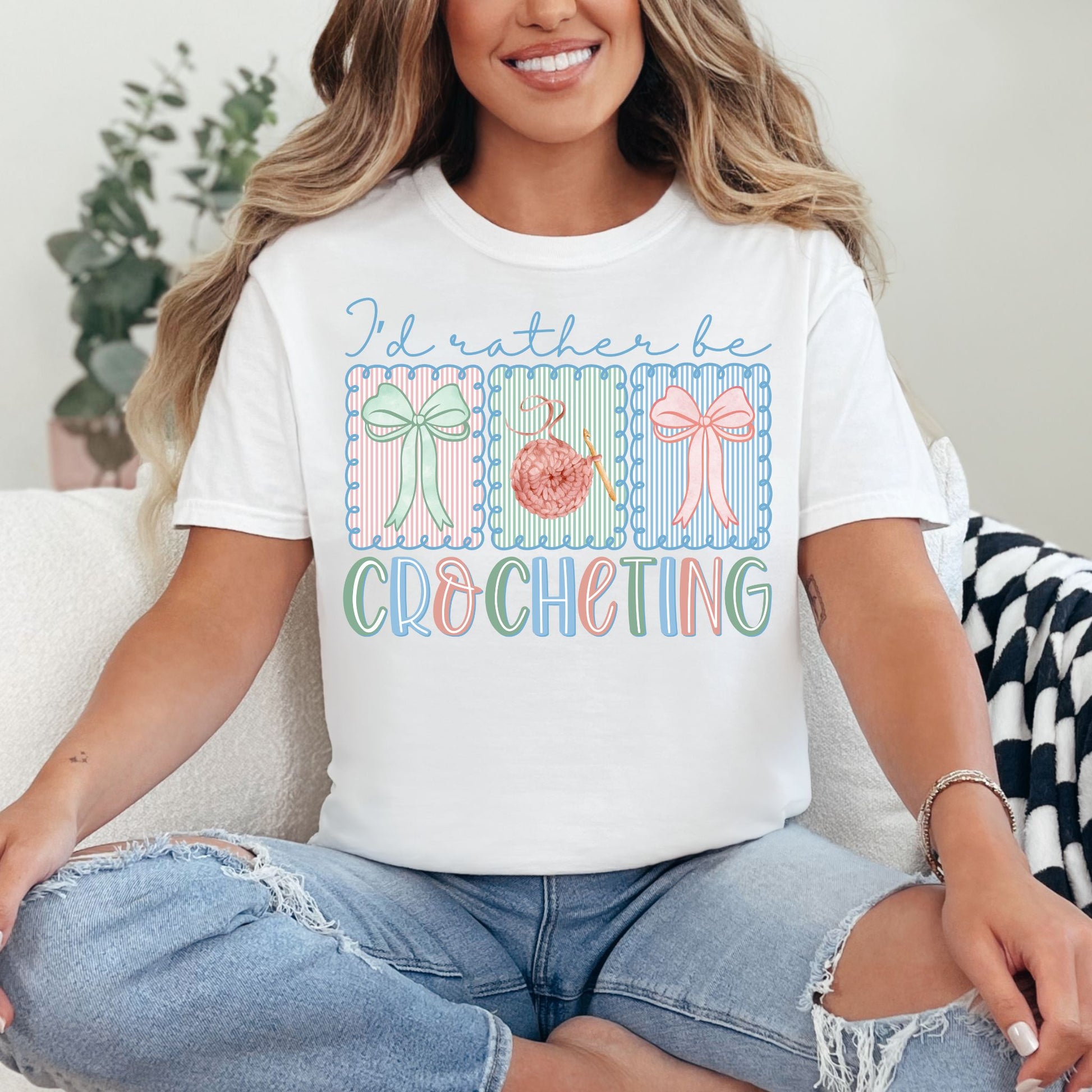 "Rather Be Crocheting" graphic on bright white (white) T-shirt.