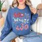 Model is wearing a Gildan 18000 Sweatshirt in deep muted blue (indigo blue) featuring the phrase “Red White & 250” in patriotic doodle-style lettering with stars and a striped bow in red, white, and blue.